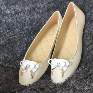 Michael Kors Cream Flats with Gold Accents